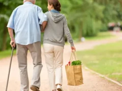 Panhandle Assistant Care Walking with Groceries